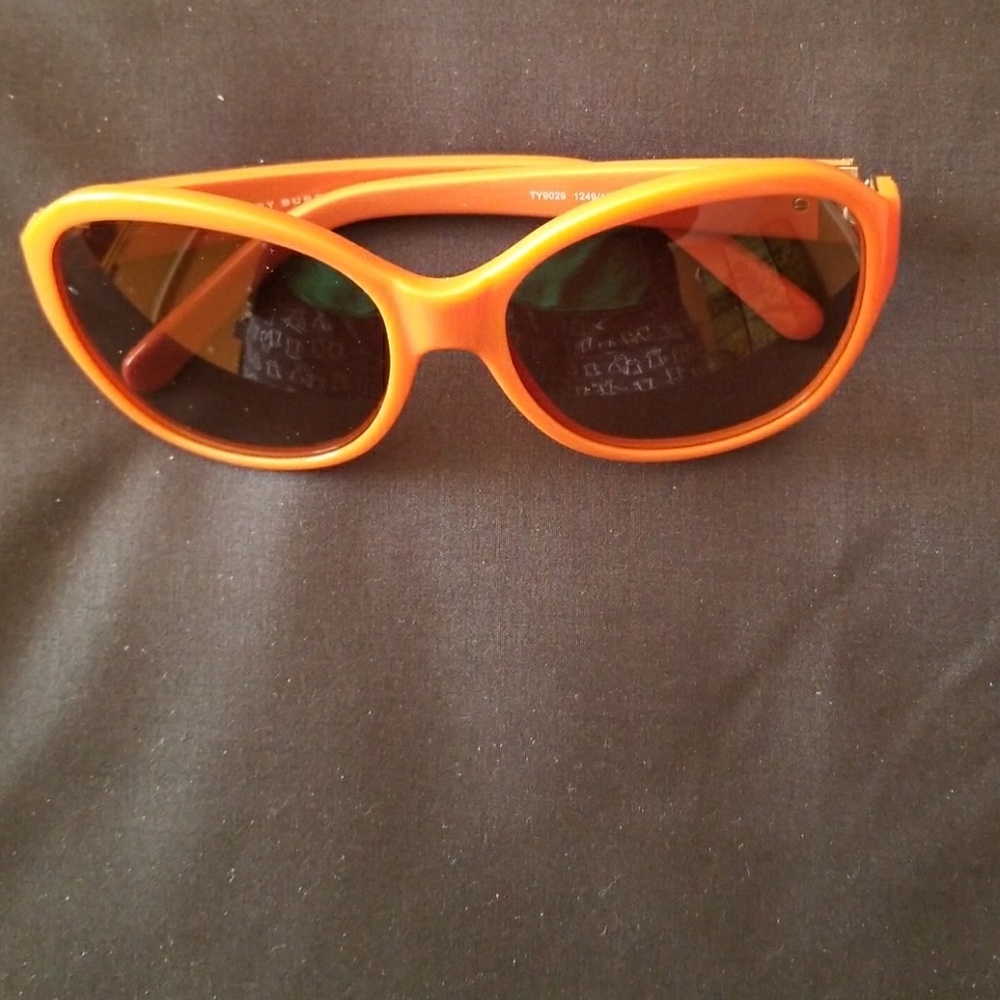 Tori Birch orange sunglasses